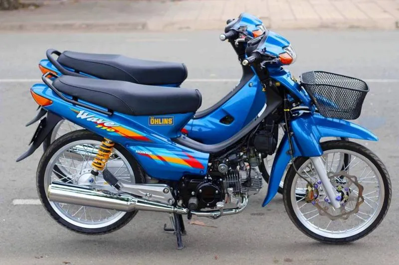 Xe Wave Alpha xanh độ mâm, phuộc và ống xả thể thao