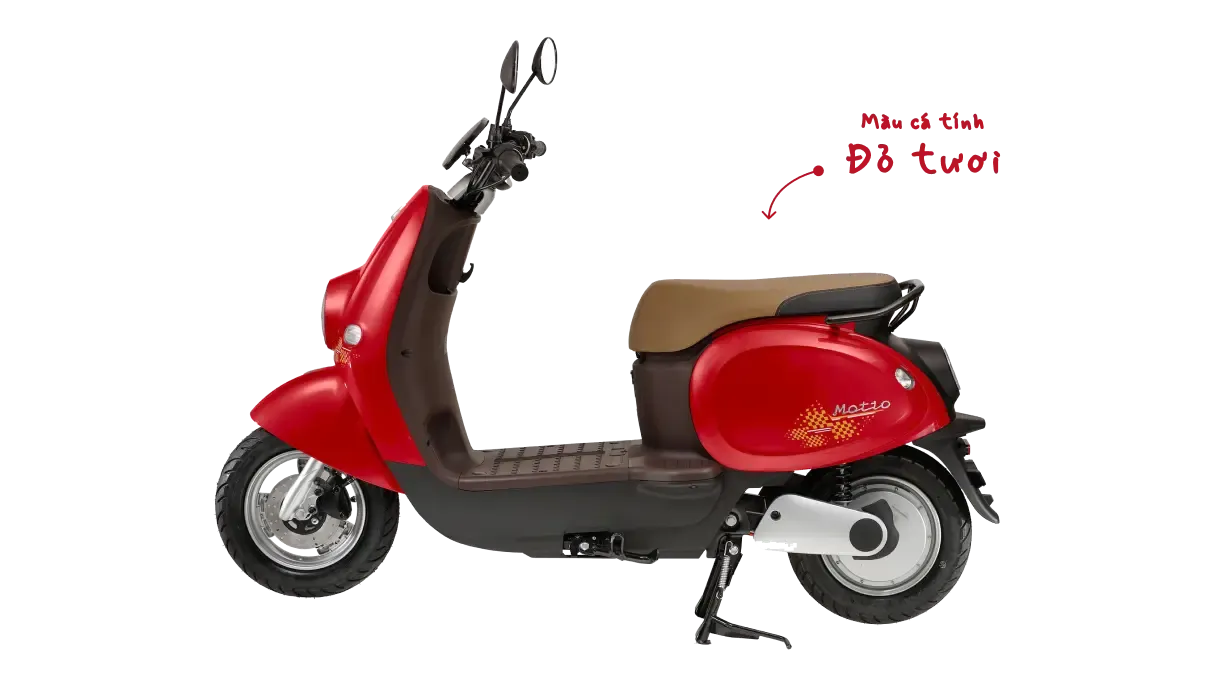 Hình ảnh tổng thể xe máy điện VinFast Motio màu đỏ với các đường nét bo tròn mềm mại