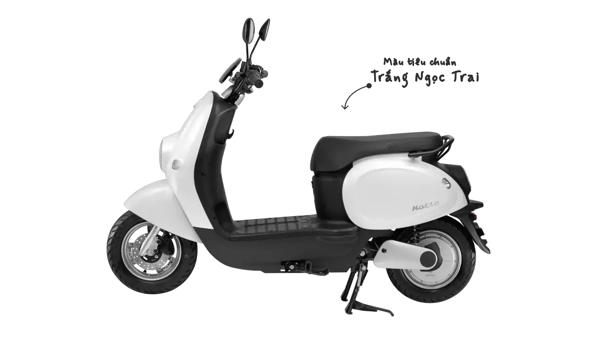 Hình ảnh xe máy điện VinFast Motio màu trắng với các chi tiết được làm nổi bật dưới ánh sáng