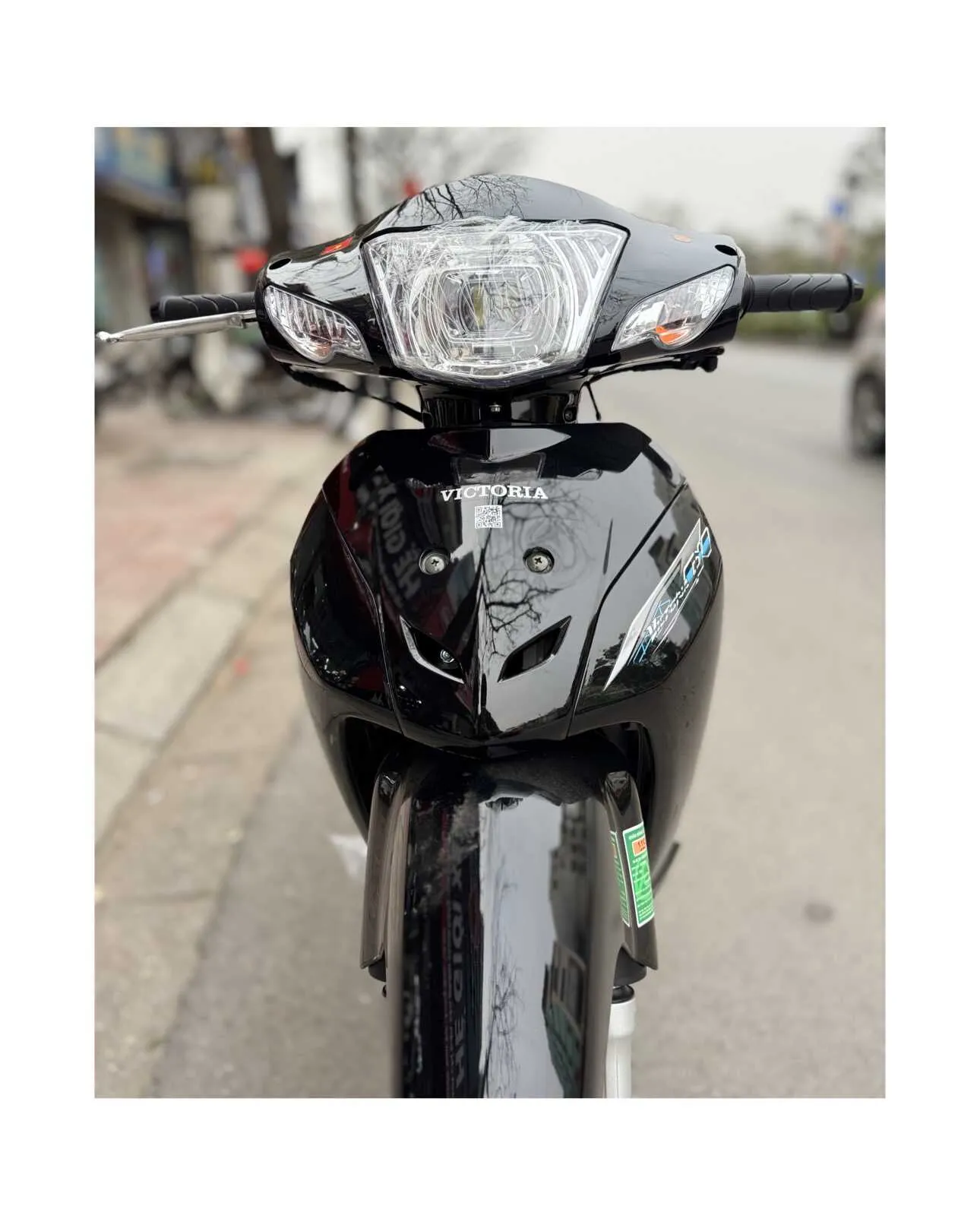 Thiết kế mặt nạ và đèn pha trước của xe Wave CX3 Victoria 50cc, tập trung vào tính khí động học