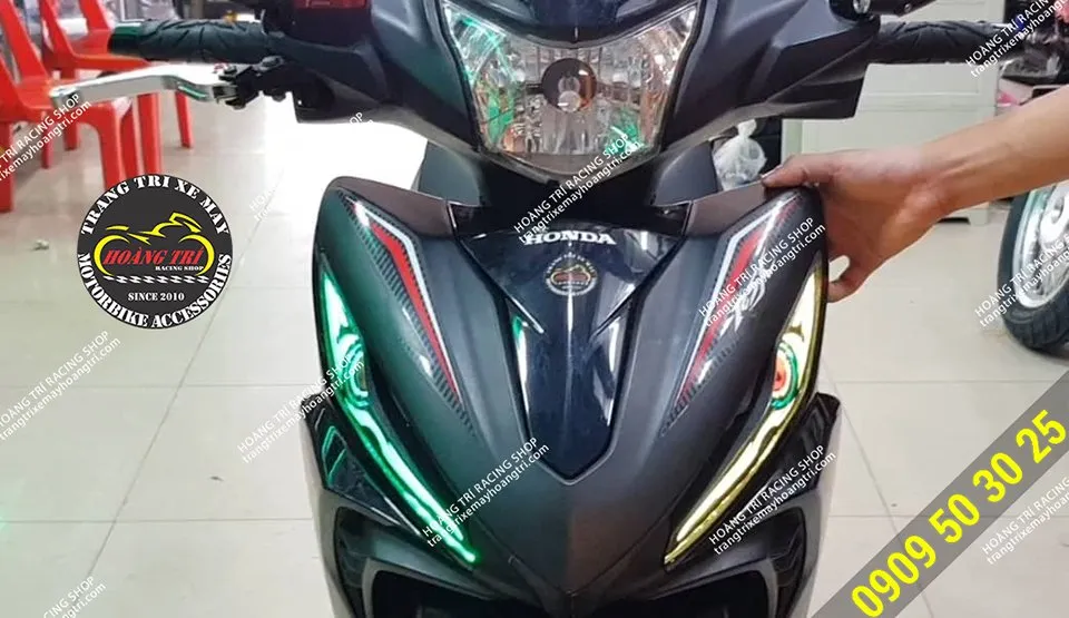 Vị trí lắp đặt công tắc điều khiển đèn Led Audi A9 trên mặt nạ xe Wave RSX 2014